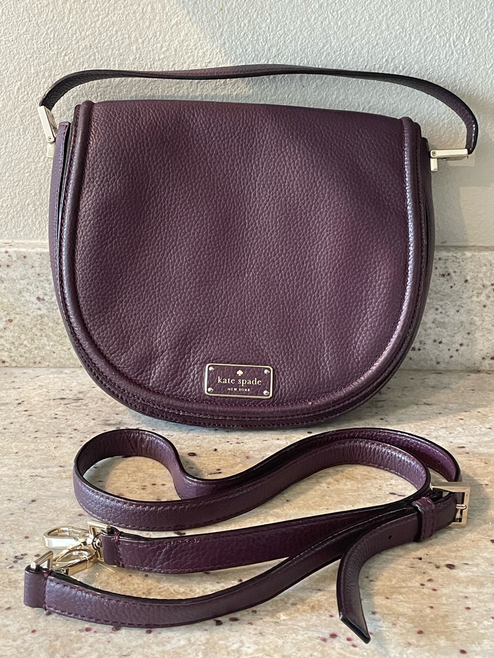 kate spade Oliver Street Dk Plum Pebbled Leather Saddle shoulder/crossbody bag.